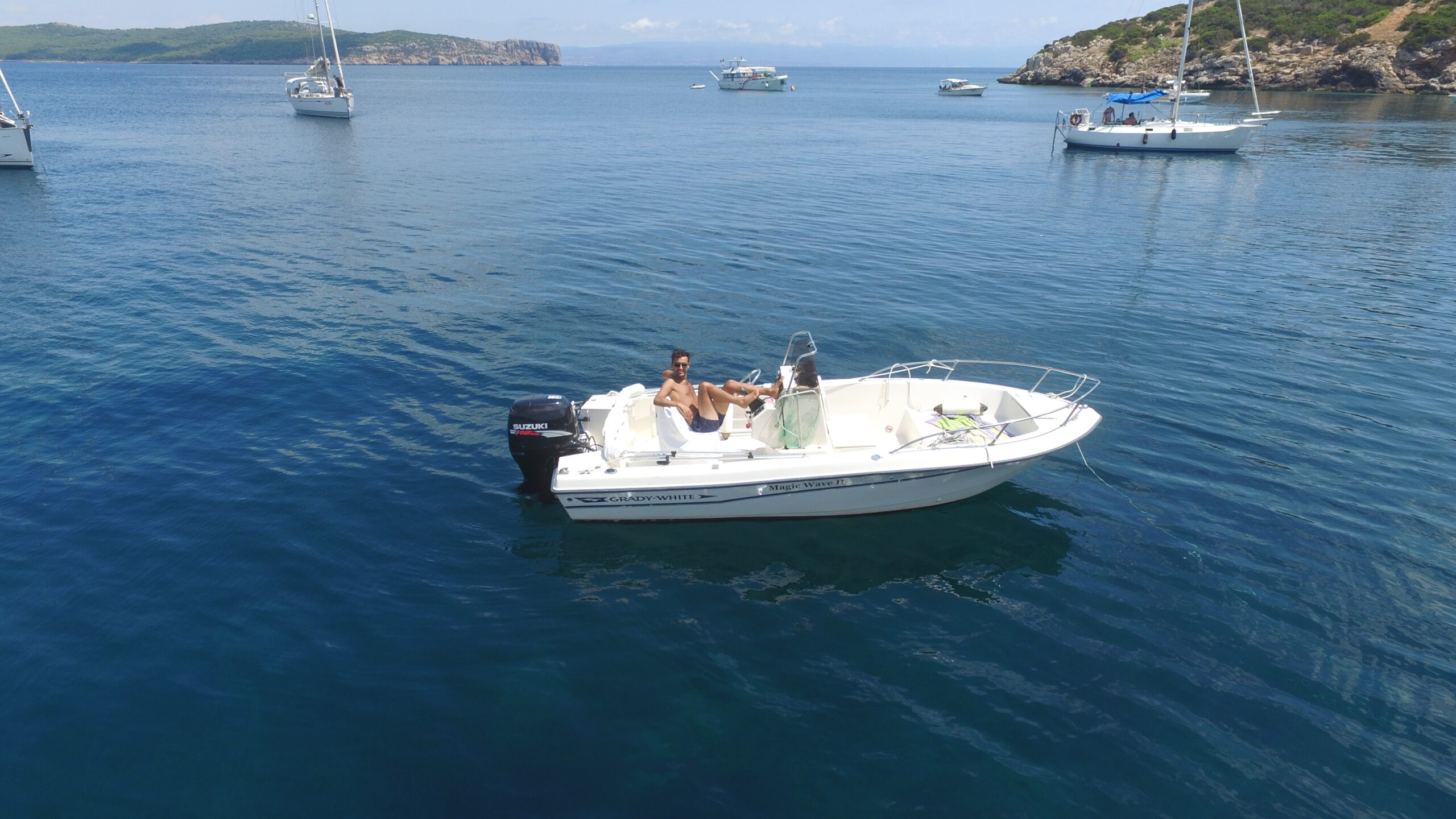 Sunbathing on boat – boat rental Alghero by Ares Turismo Alghero
