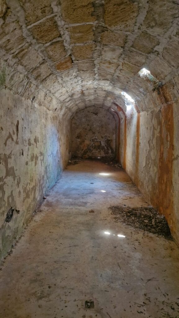 Interior of the underground tunnels of the Second World War batteries at Monte Dolla, Alghero, a stop on a historical van tour.